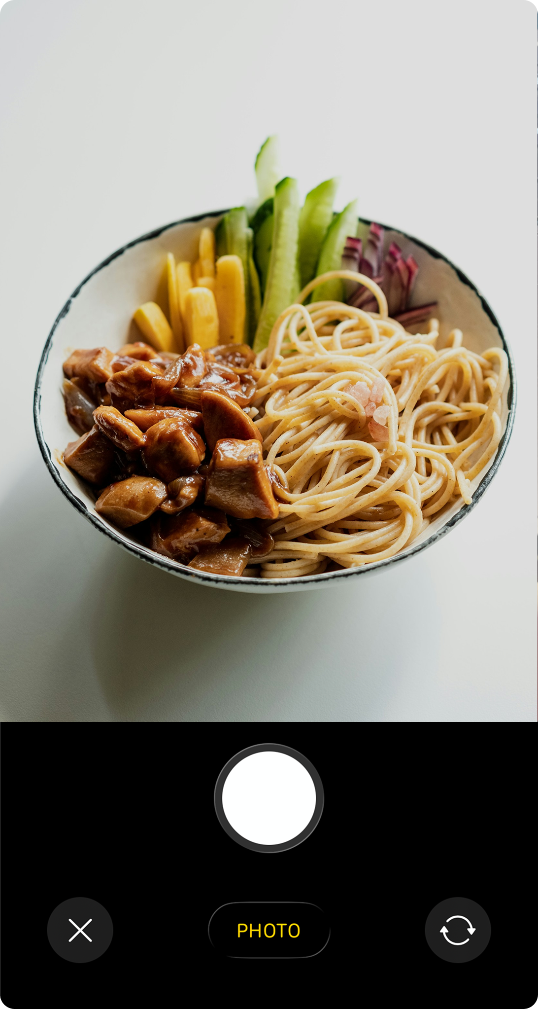 Camera view of a meal being photographed